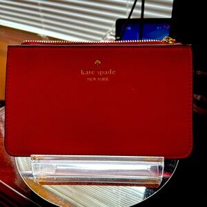 NWOT Kate Spade wristlet in red